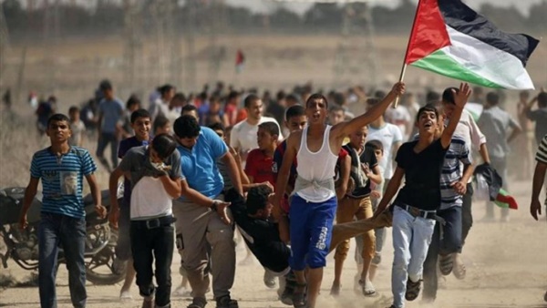 استشهاد فلسطينية وإصابة 10 متظاهرين برصاص الجيش الإسرائيلي في غزة